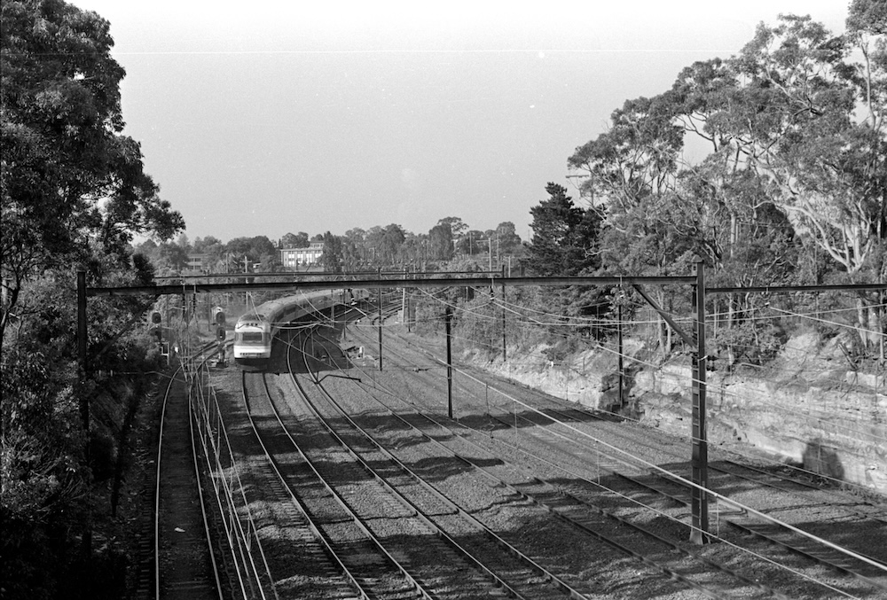 One of the blogger’s first photos, of an XPT passing under a bridge at an intersection between two train lines. B&W shot on Ilford HP4 using a Pentax Spotamtic camera.